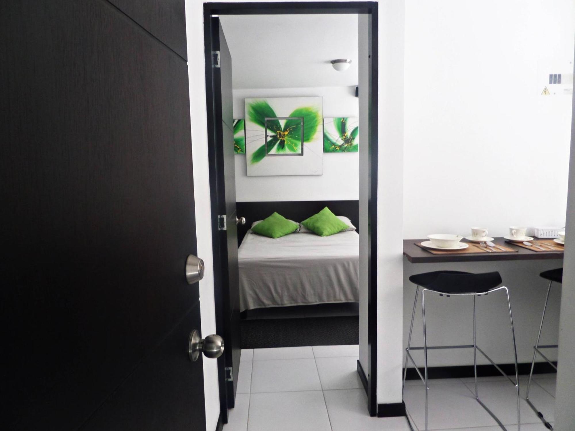 Apartasuites San Marcos Cali Room photo